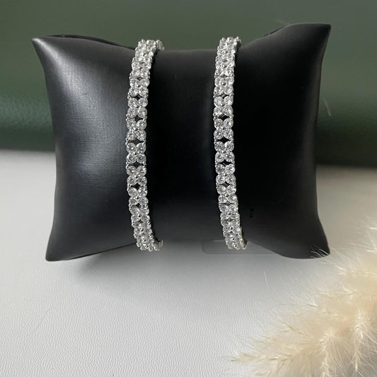 beautiful 4 petal flower design in cubic zirconia rhodium plated bangles
