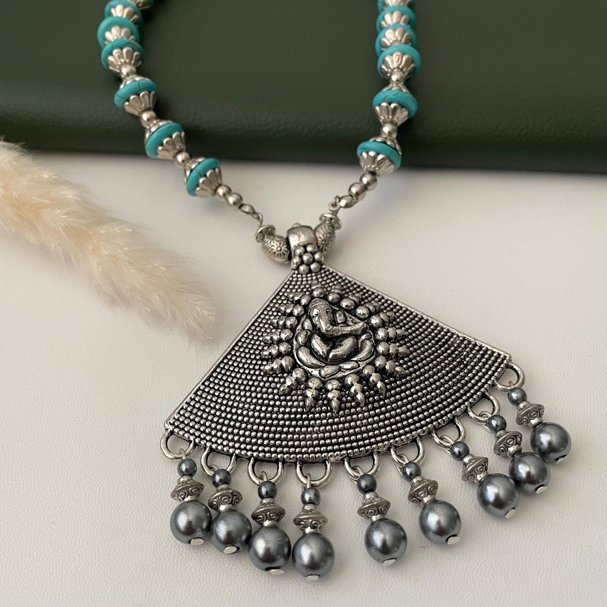 Nysaa Oxidised blue grey Ganapati pendent necklace