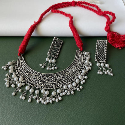 Oxidised thread necklace in red and yellow with matching earrings