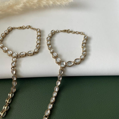 Antique gold colored kundan and pearl haath panja