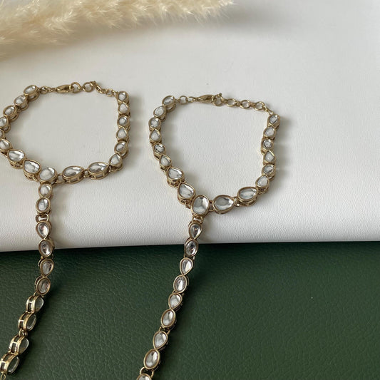 Antique gold colored kundan and pearl haath panja