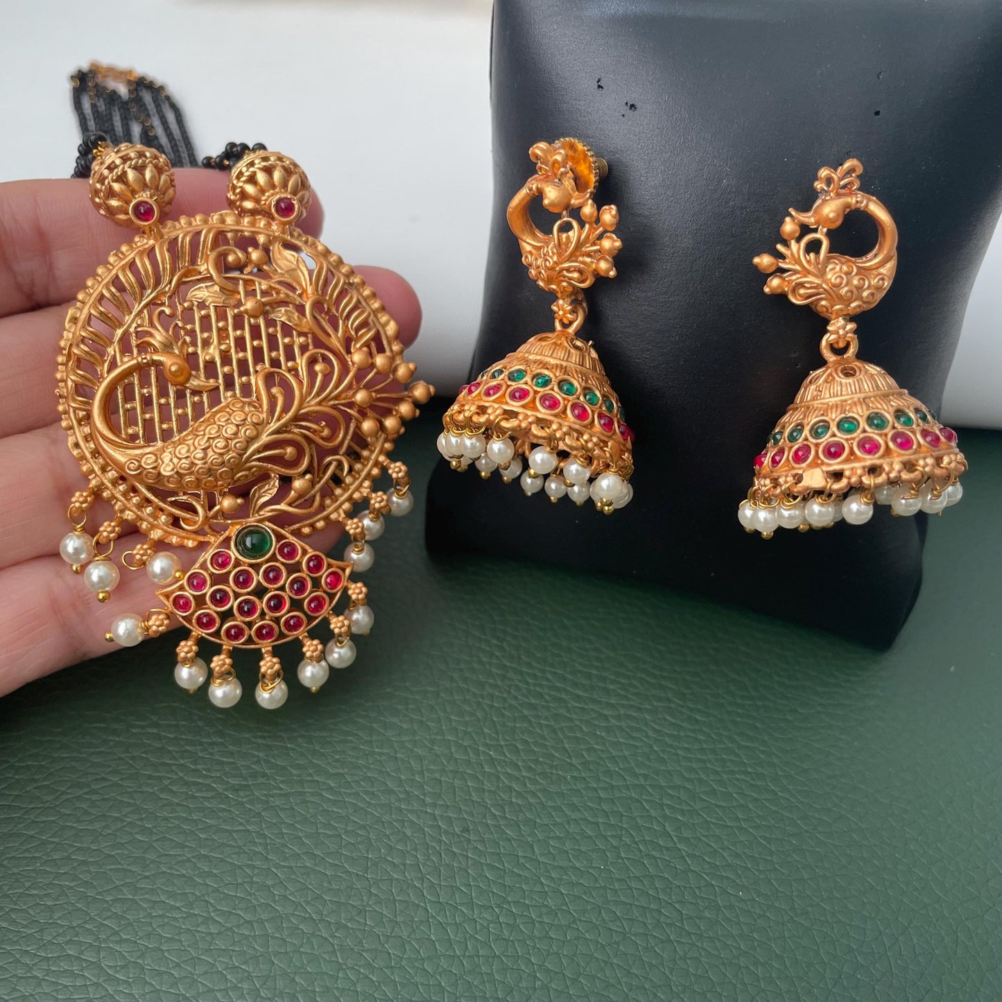 Restocked : Gold plated temple themed mangalsutra, black beaded ethnic necklace with jhumkis