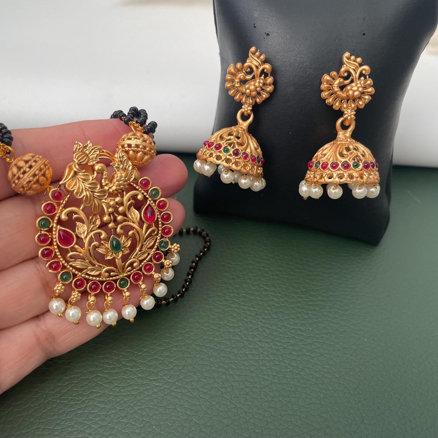 Restocked : Gold plated temple themed mangalsutra, black beaded ethnic necklace with jhumkis