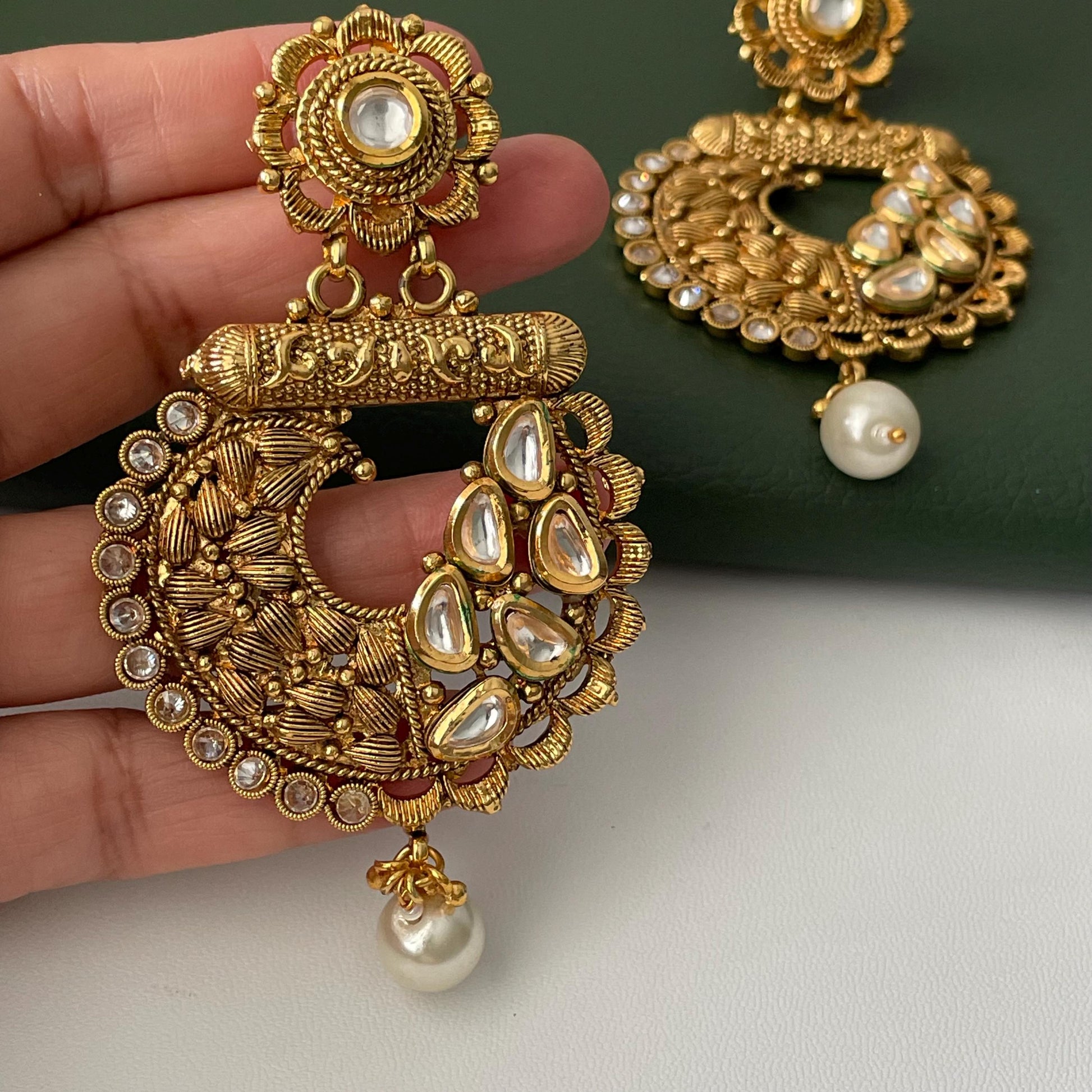 Nysaa gold plated kundan or minakari party earrings