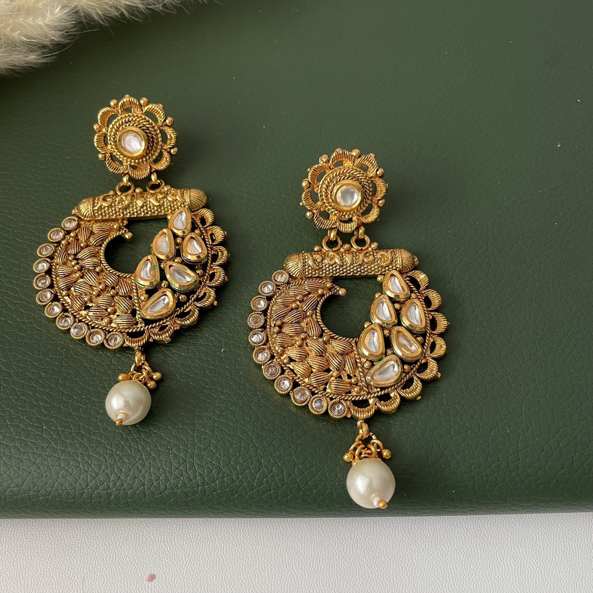 Nysaa gold plated kundan or minakari party earrings