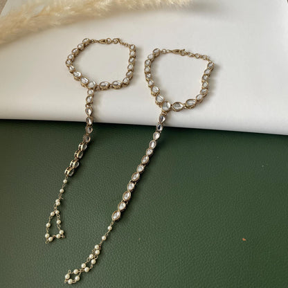 Antique gold colored kundan and pearl haath panja