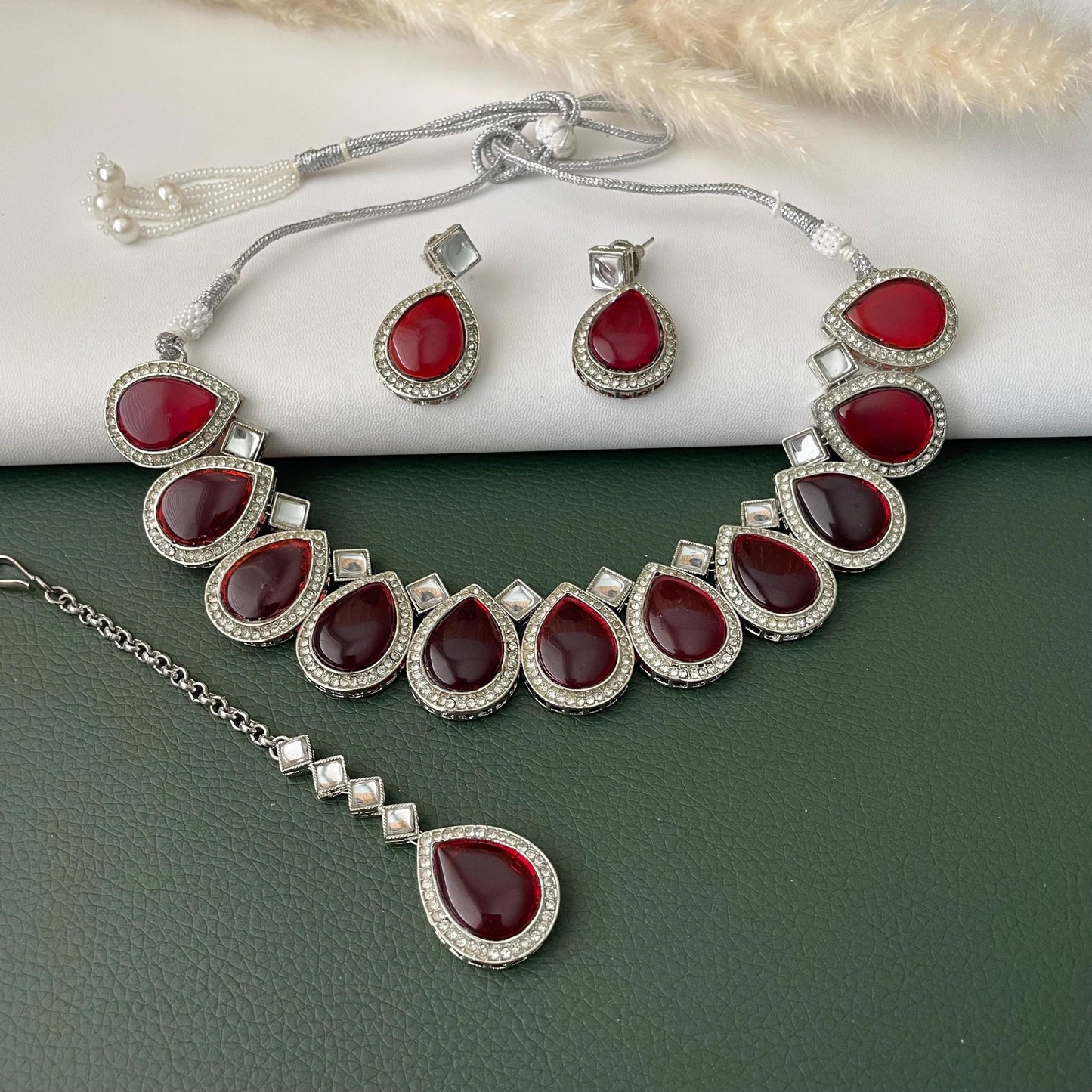 Maroon color kundan and AD necklace set with Maang tika Diwali party wear