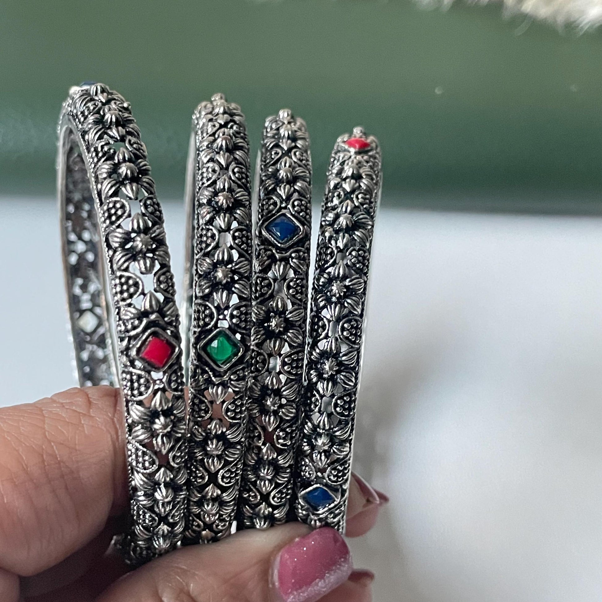 Restocked Oxidized flower motif bangles: Set of 4
