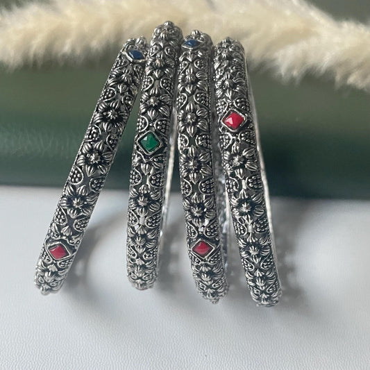 Restocked Oxidized flower motif bangles: Set of 4