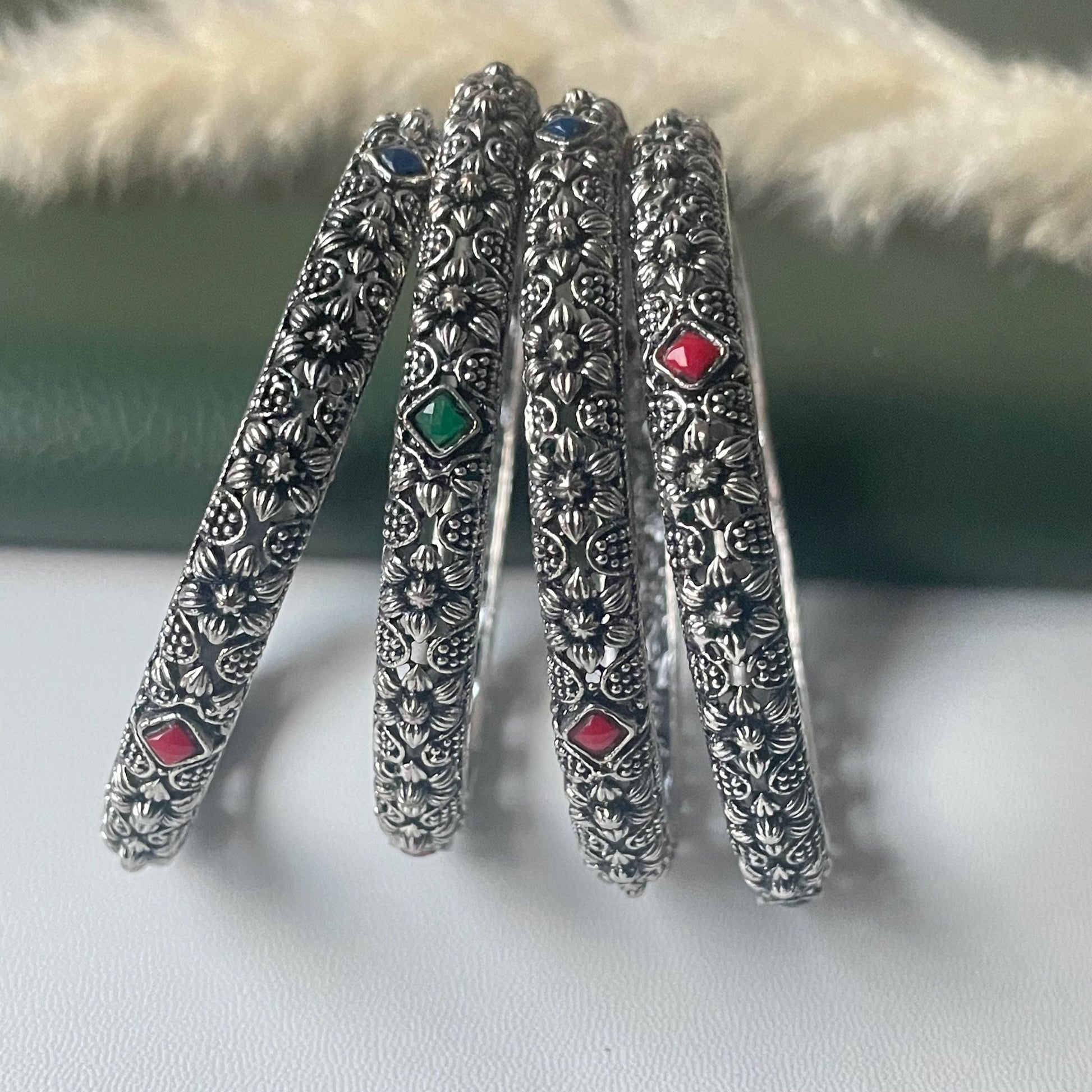 Restocked Oxidized flower motif bangles: Set of 4
