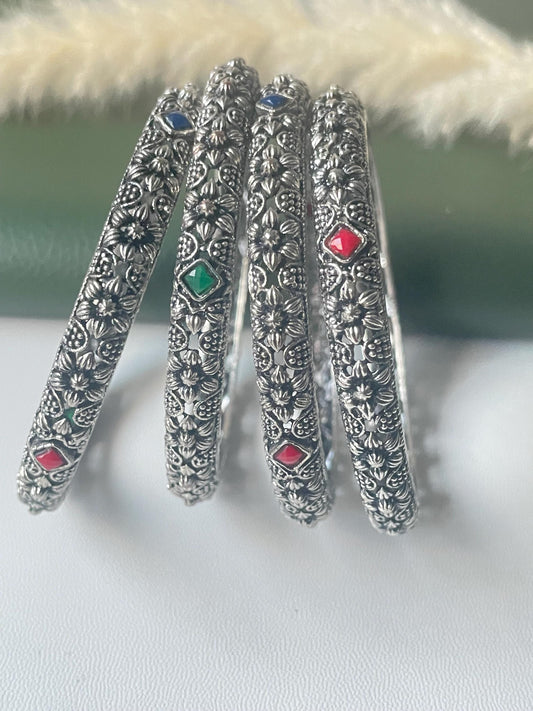 Restocked Oxidized flower motif bangles: Set of 4