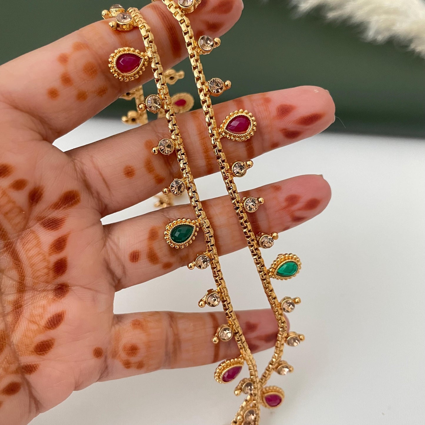 Gold plated high quality bridal anklets in Ruby and green gems