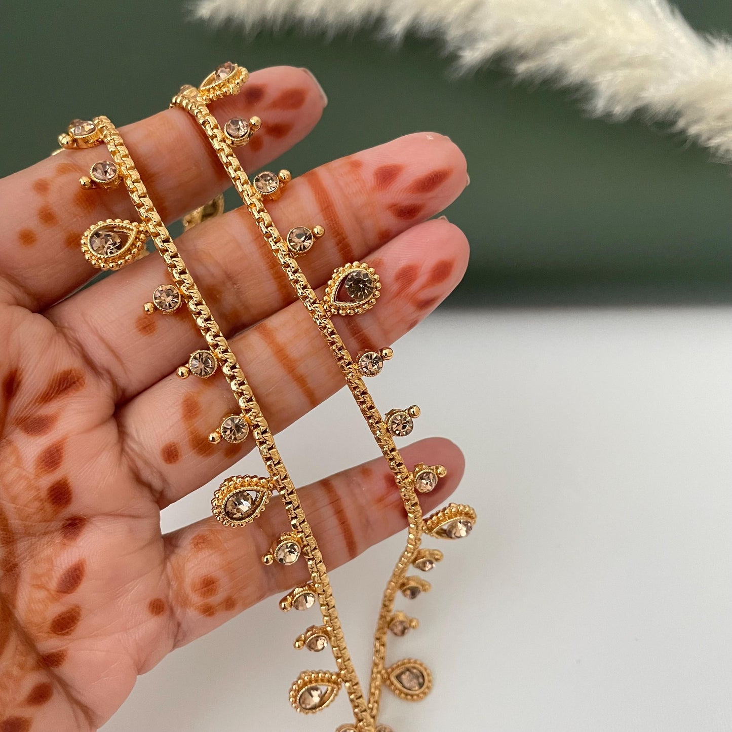 Gold plated bridal payal anklets in Ruby Green and lct