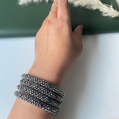Restocked Oxidized flower motif bangles: Set of 4