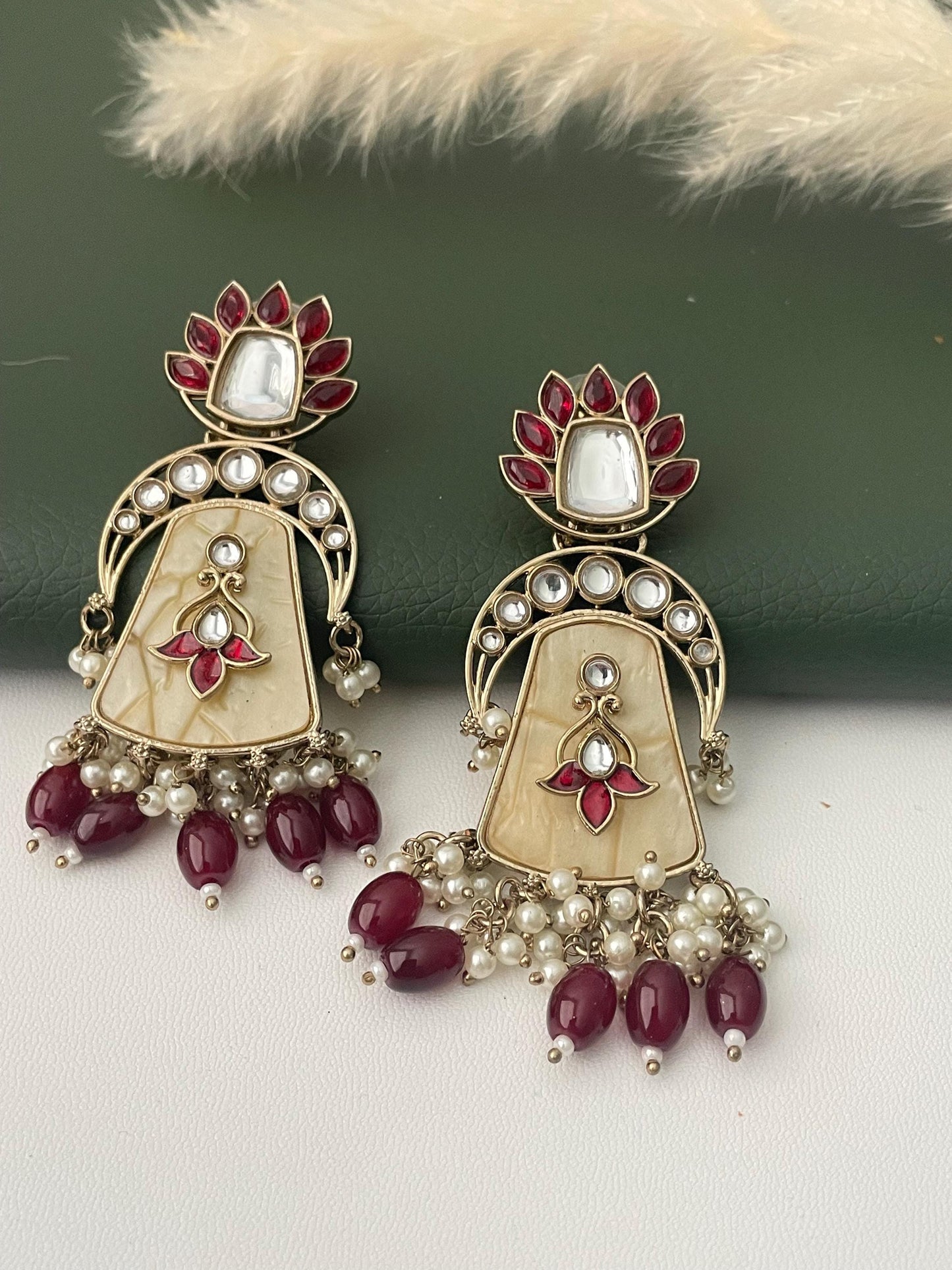 Kundan teal black or maroon beads earrings