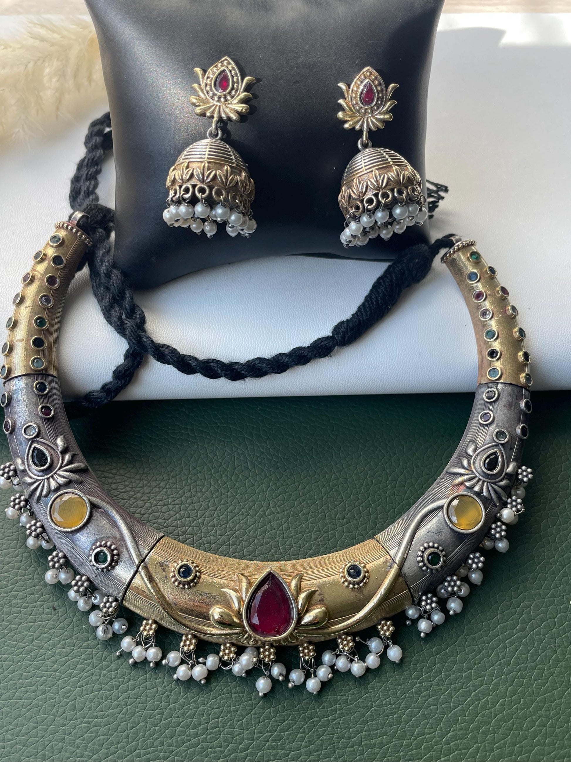 Dual tone Oxidised hasli necklace with multicolor stone and faux pearls