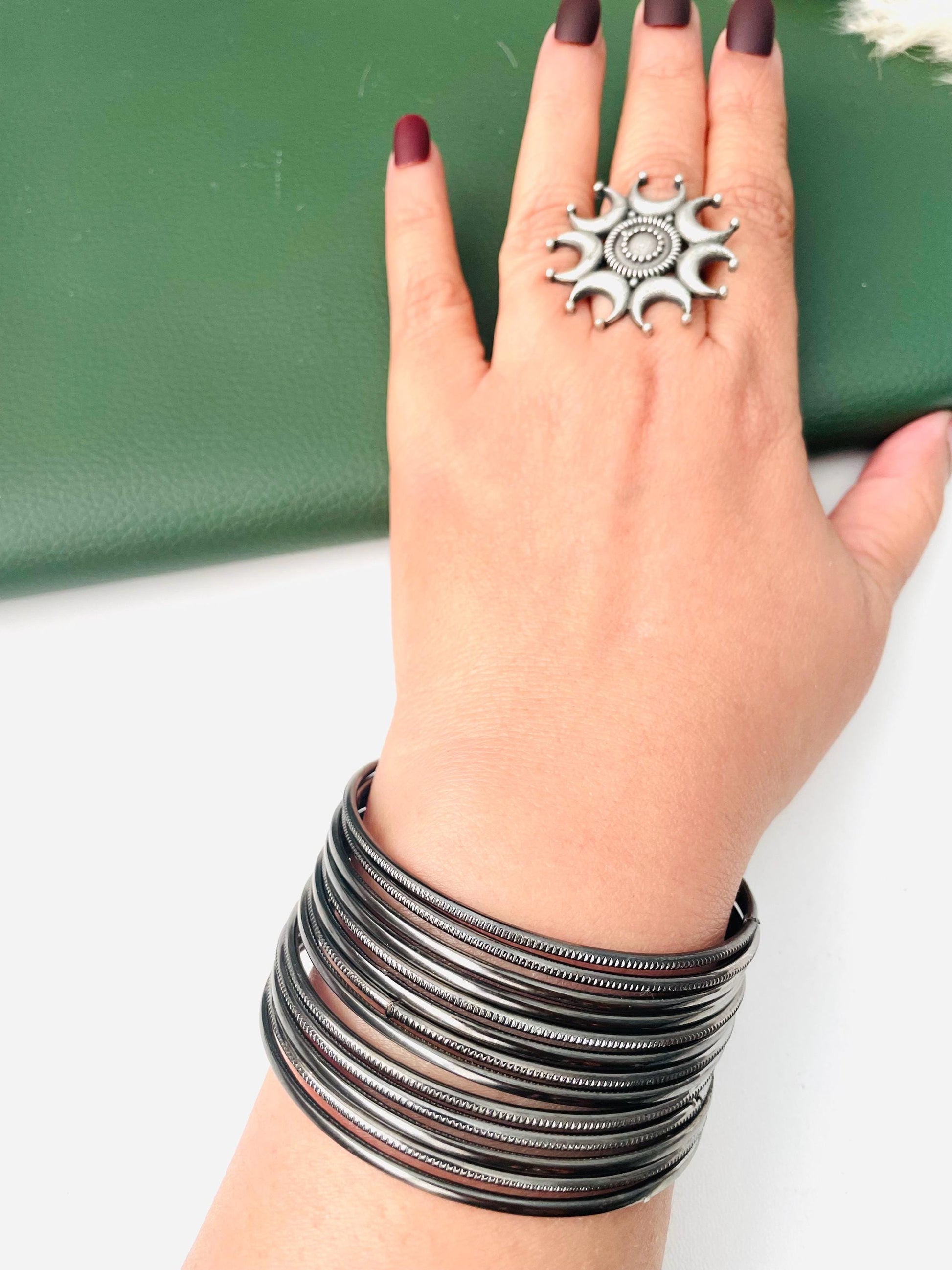 Nysaa Oxidised metal and gold metal bangles : set of 12 thin babgles