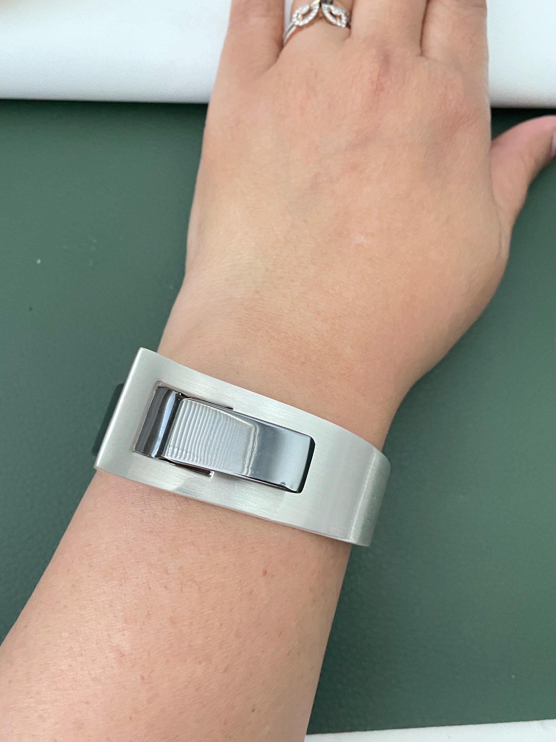 Silver and black fancy cuff bracelets