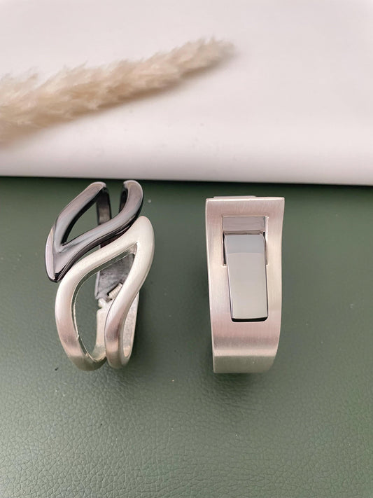 Silver and black fancy cuff bracelets