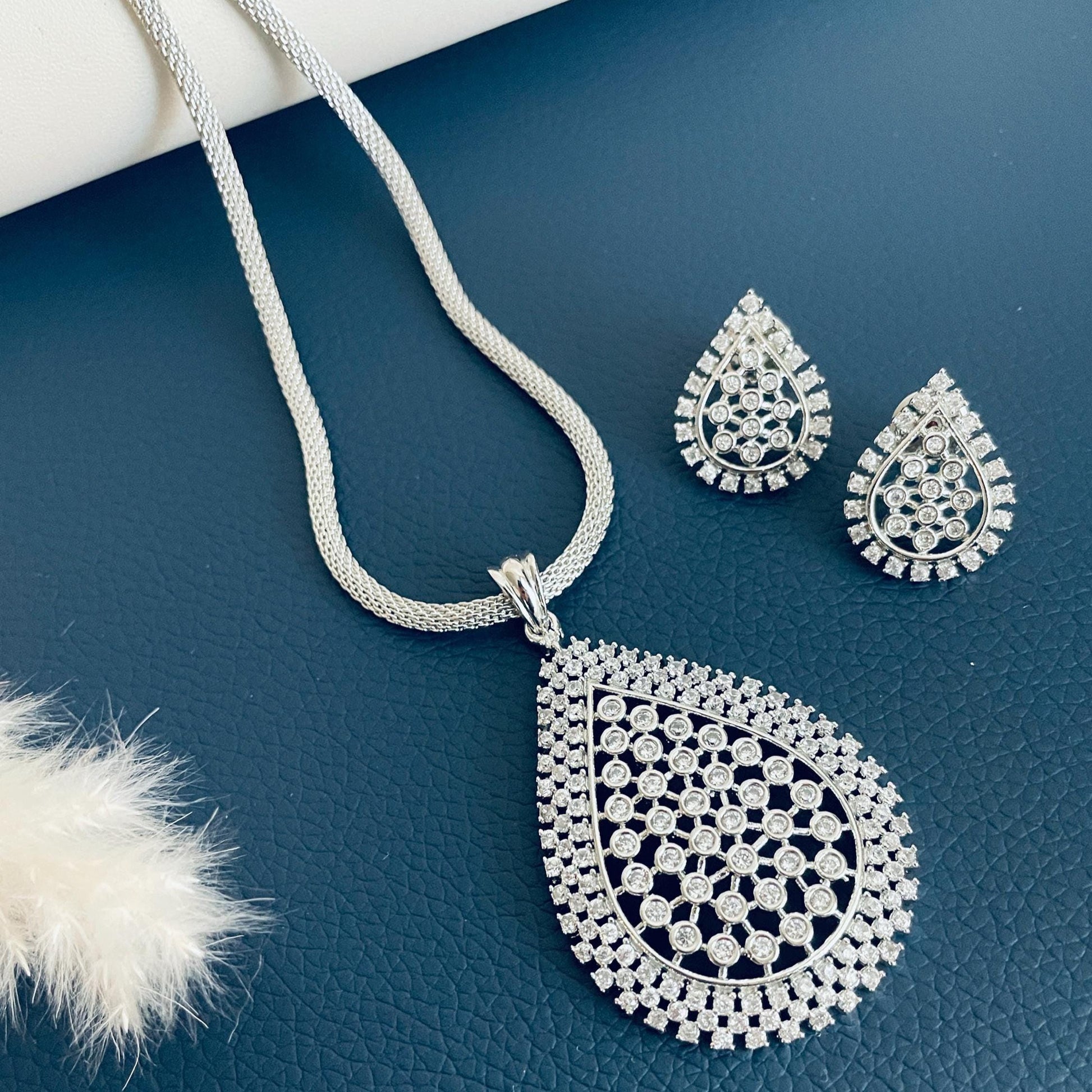 Cubic Zirconia pendant necklace set in rhodium plating or dual tone plating