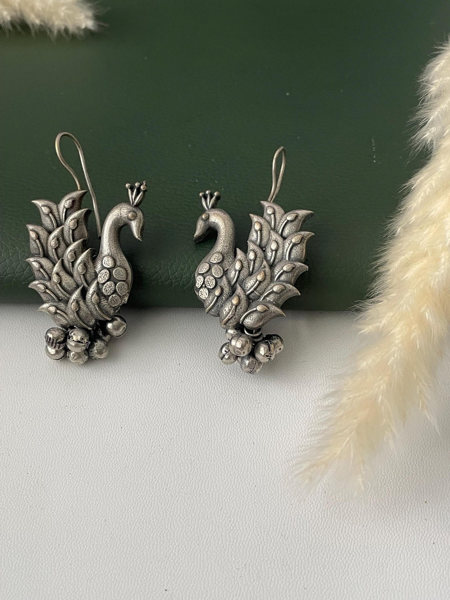 Oxidized peacock dangling earrings