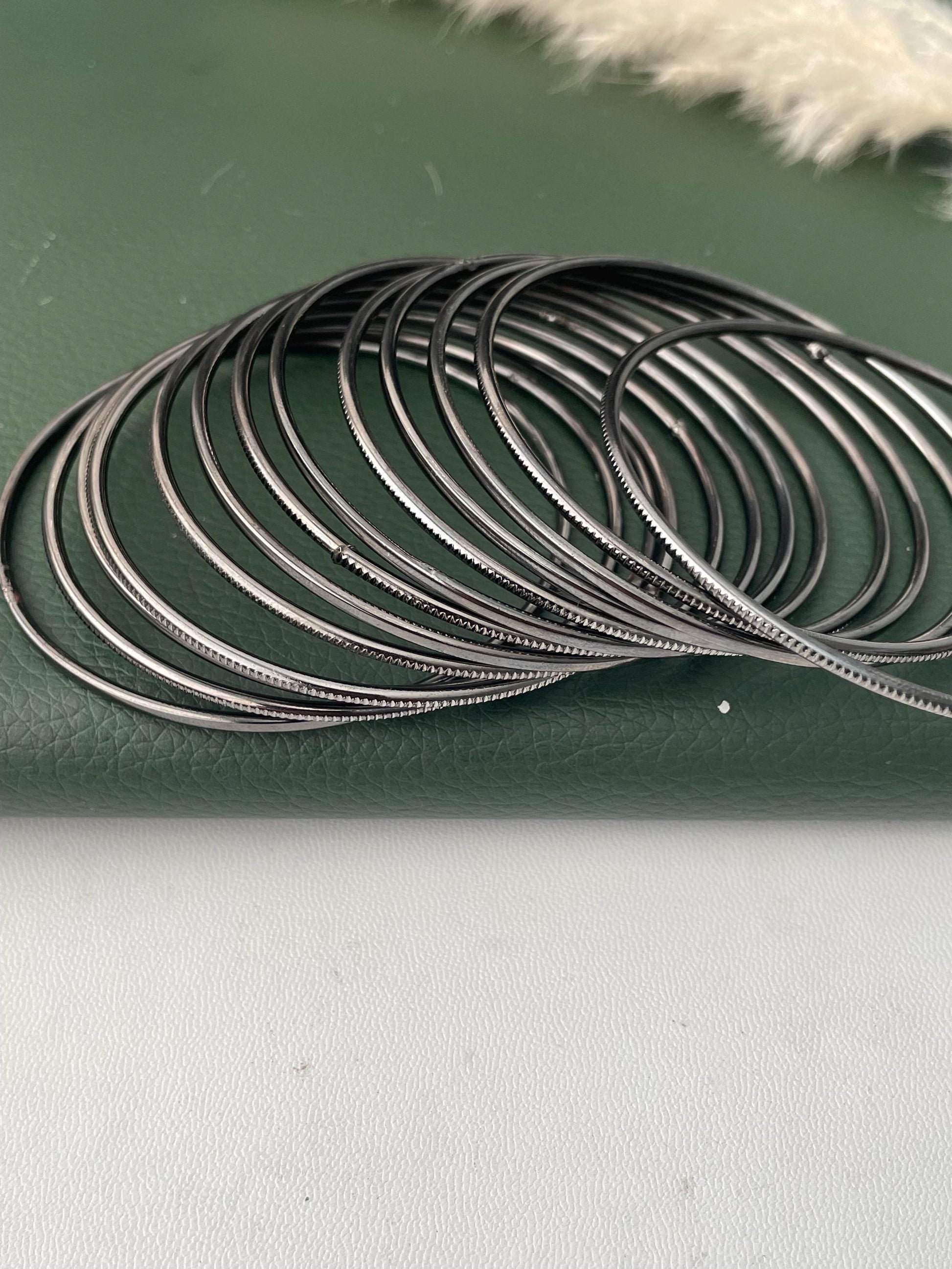 Nysaa Oxidised metal and gold metal bangles : set of 12 thin babgles