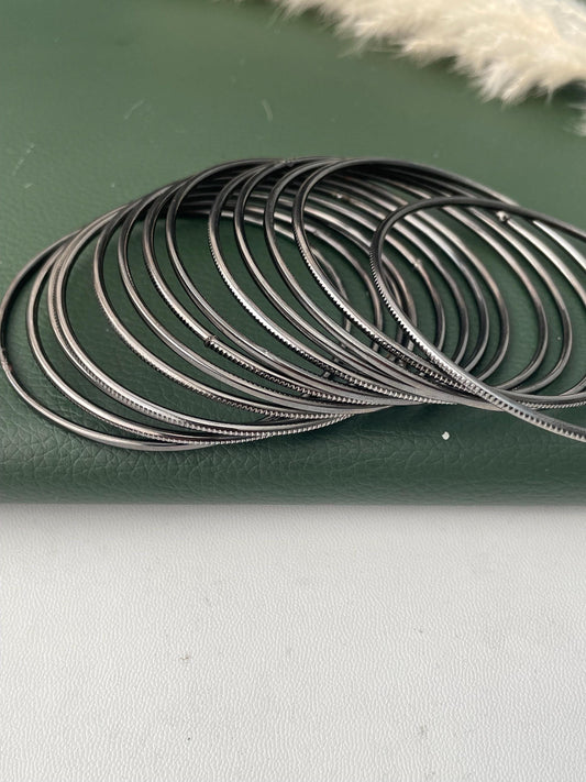 Nysaa Oxidised metal and gold metal bangles : set of 12 thin babgles