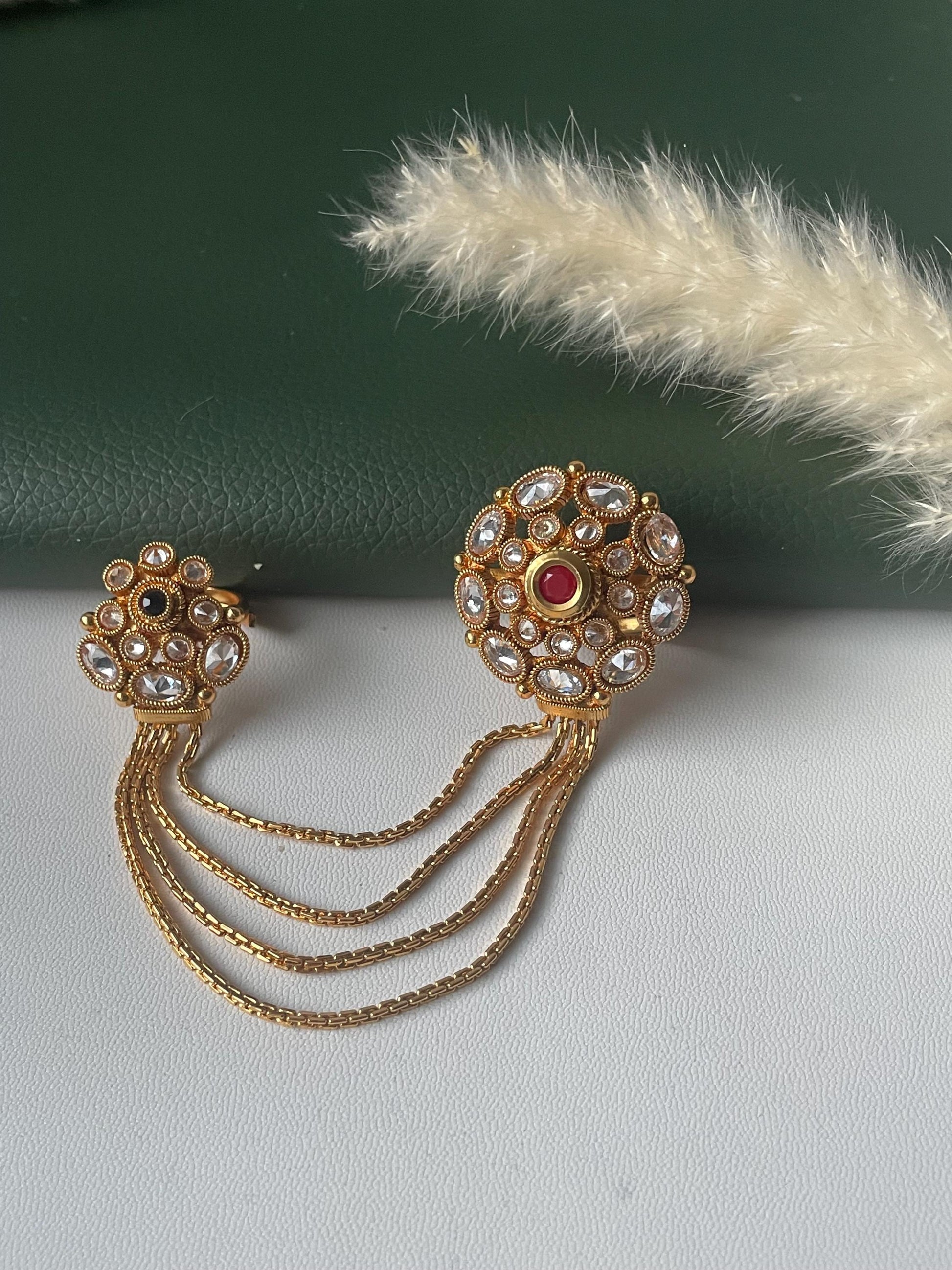 Gold plated two finger kundan chain ring