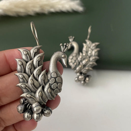 Matt Oxidised peacock dangling  earrings or wear it as a bugadi