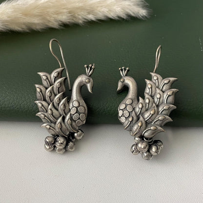 Oxidized peacock dangling earrings