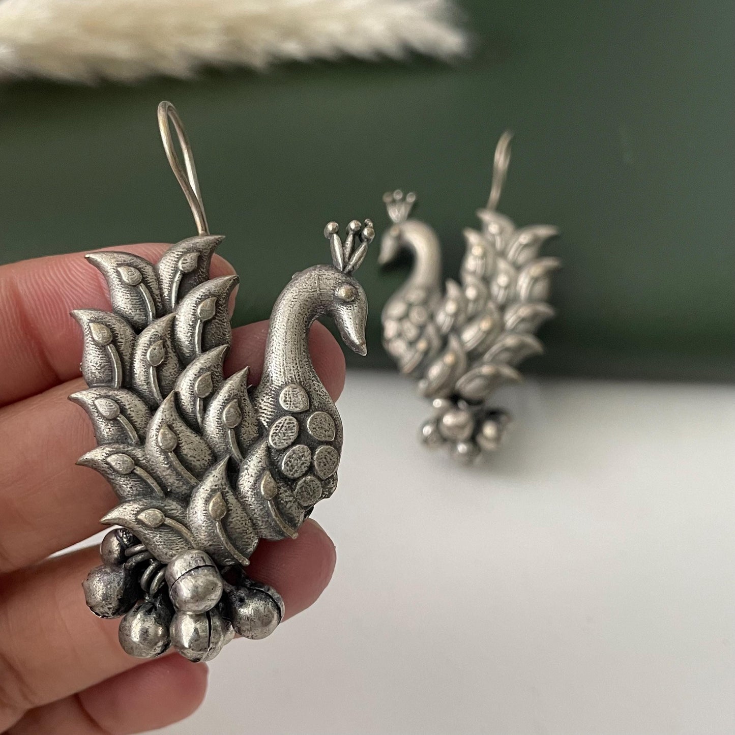 Oxidized peacock dangling earrings