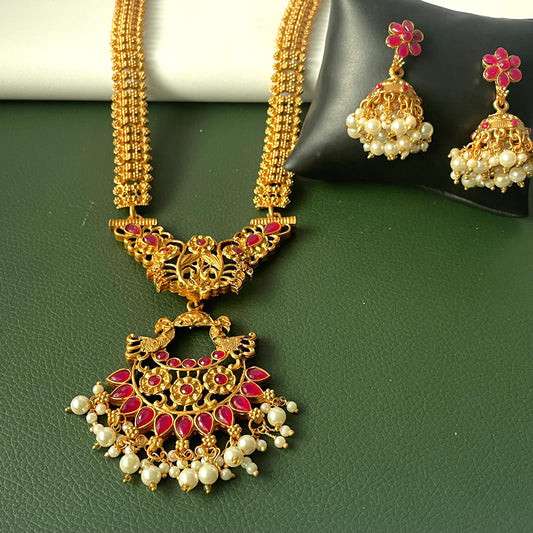 Kemp stone gold plated long haaram with matching earrings South Indian temple jewelry