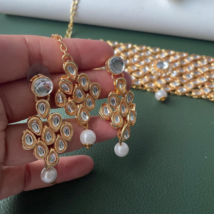 Gold plated kundan choker set with earrings and Maang tikka