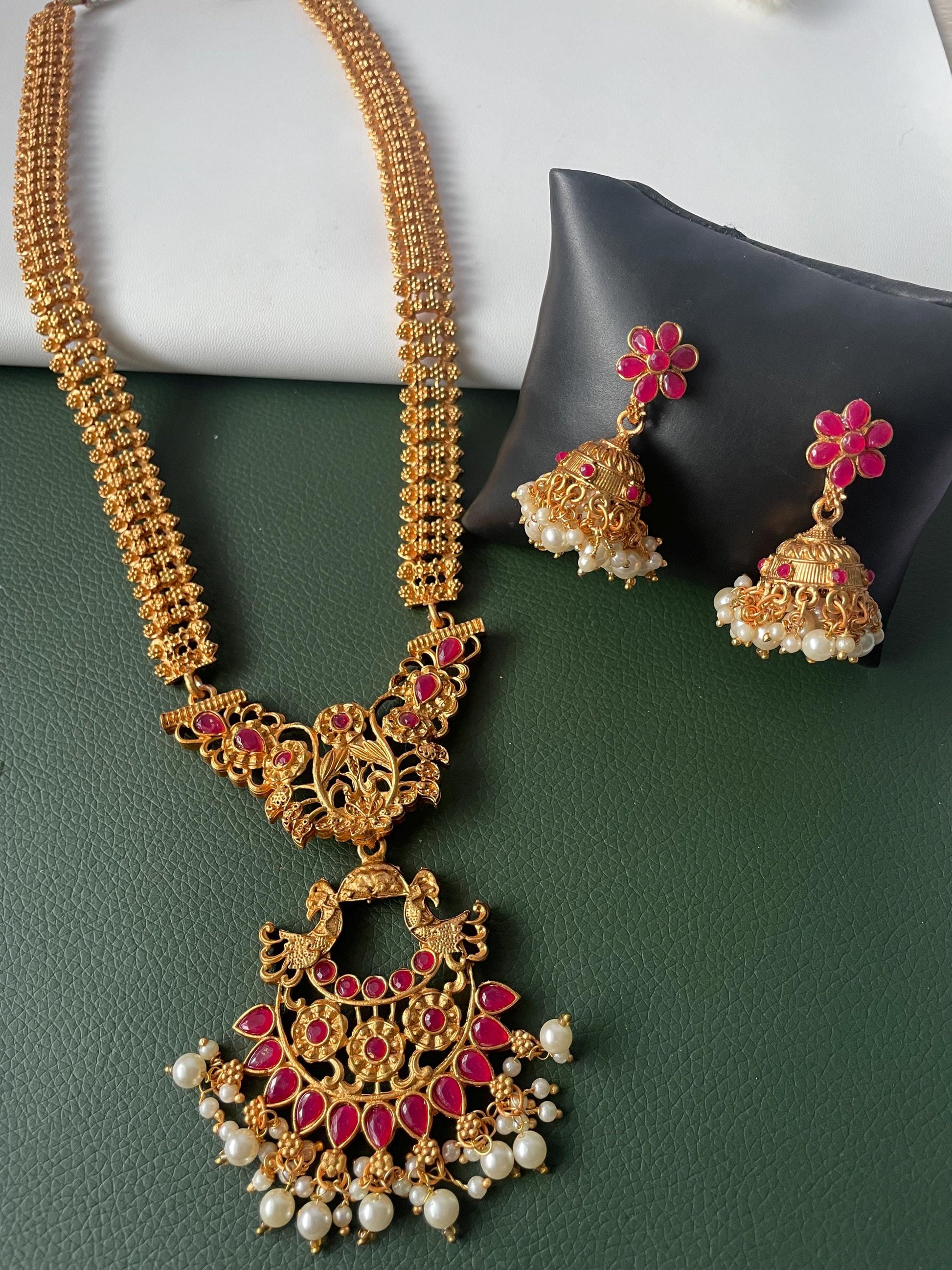 Kemp stone gold plated long haaram with matching earrings South Indian temple jewelry