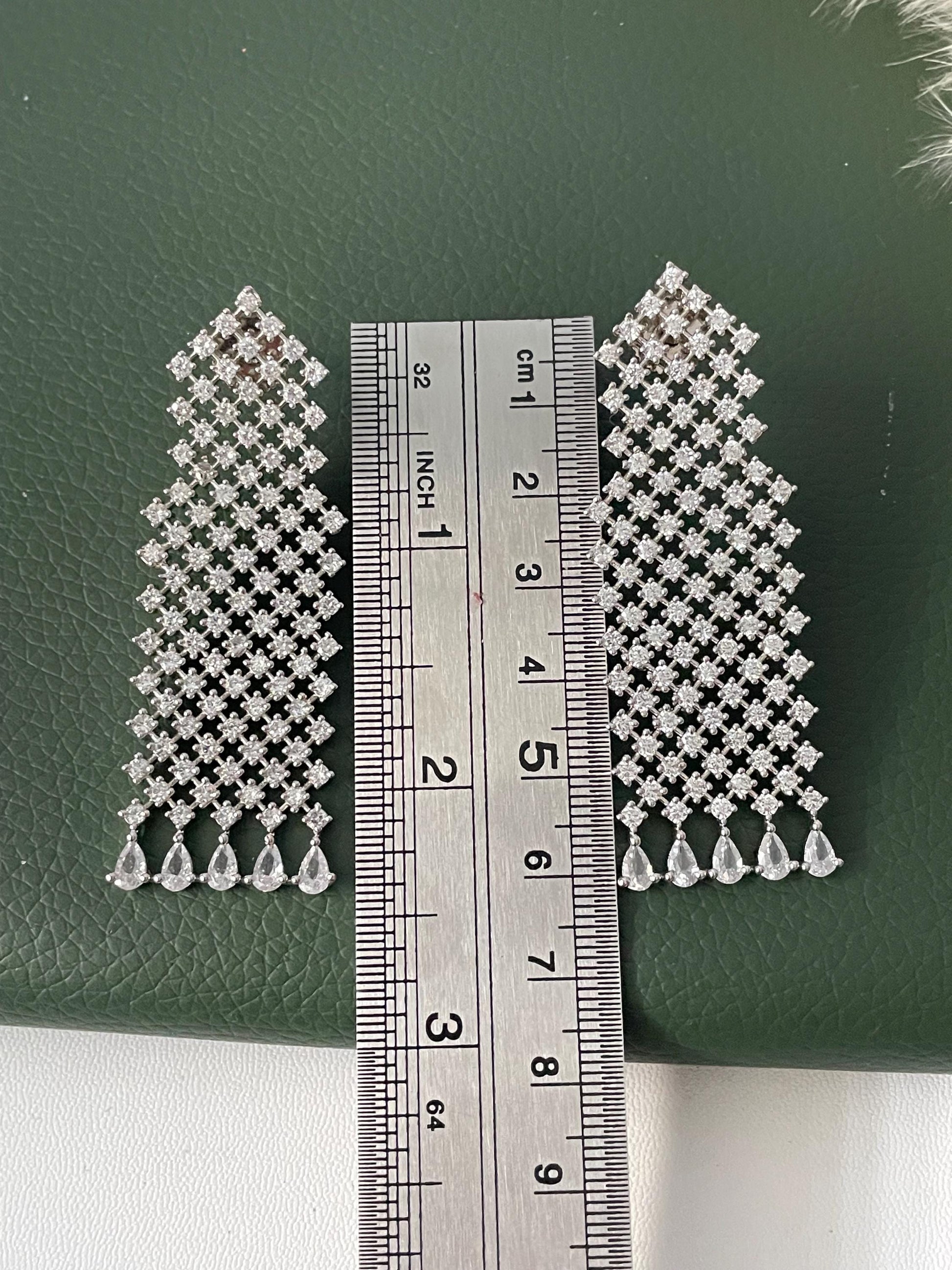 Nysaa Rhodium plated cubic zirconia long earrings