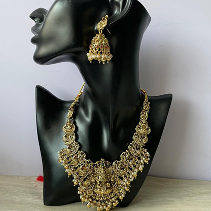 Lakshmi pendent kemp stone antique gold plated choker set with earring in green