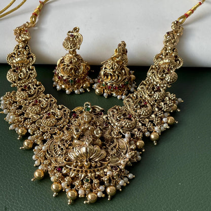 Lakshmi pendent kemp stone antique gold plated choker set with earring in green