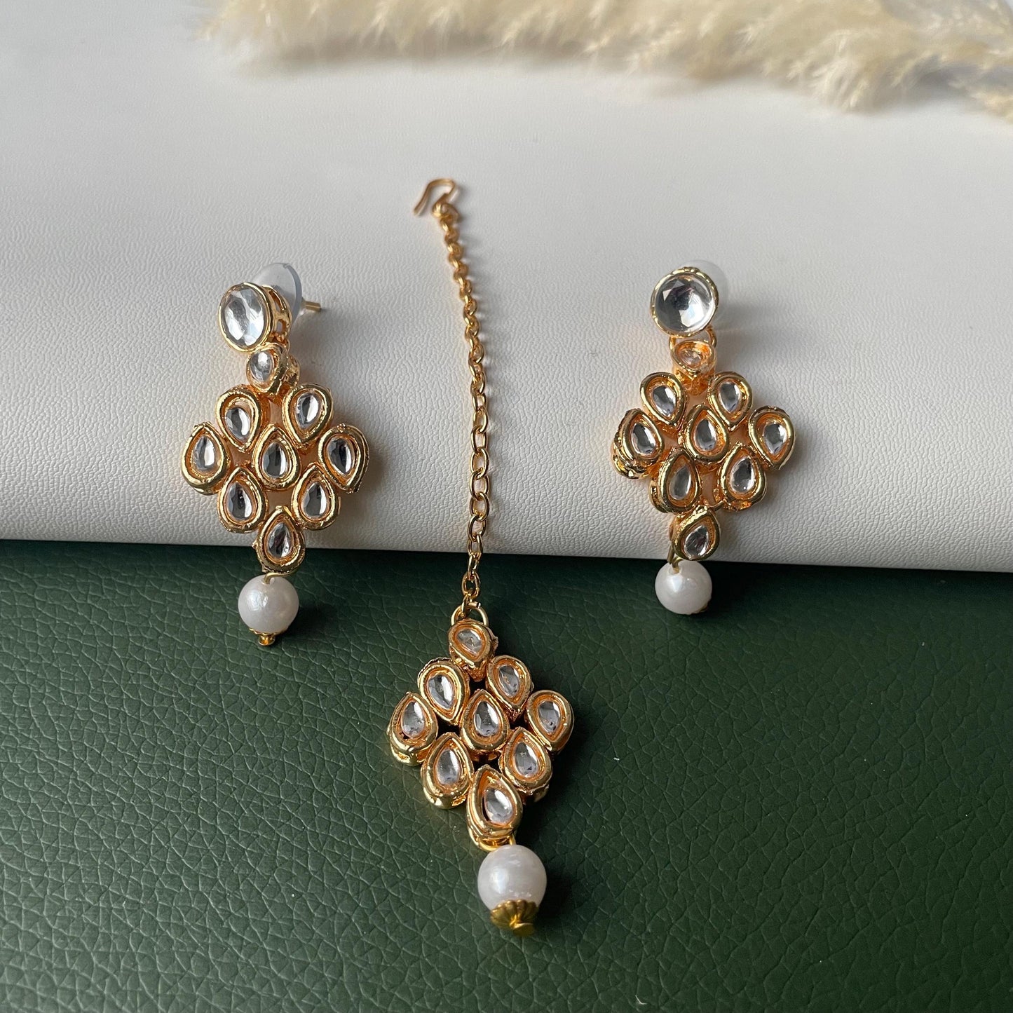 Gold plated kundan choker set with earrings and Maang tikka