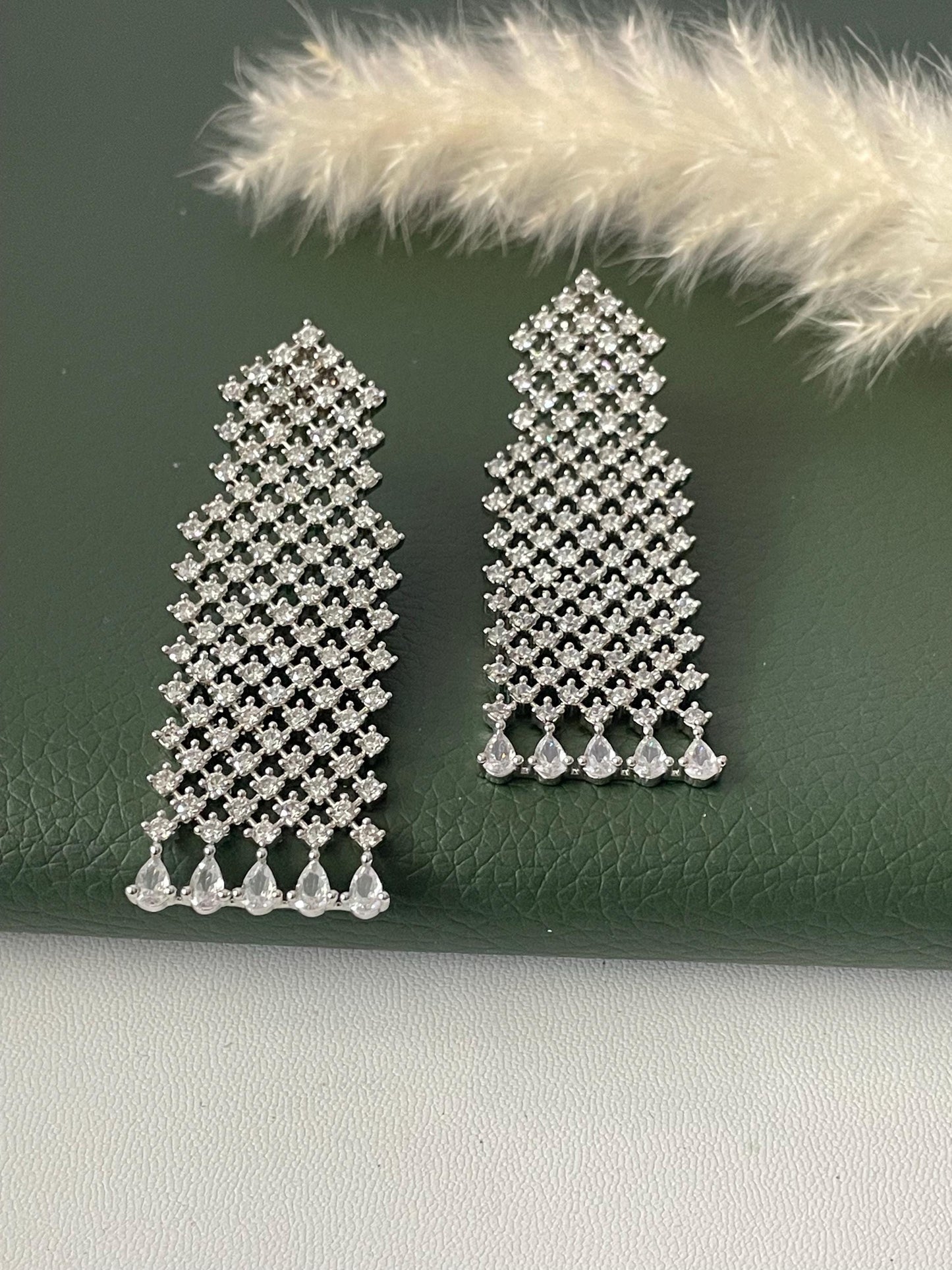 Nysaa Rhodium plated cubic zirconia long earrings