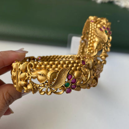 Gold plated kemp stone openable bangles with elephant flower carvings
