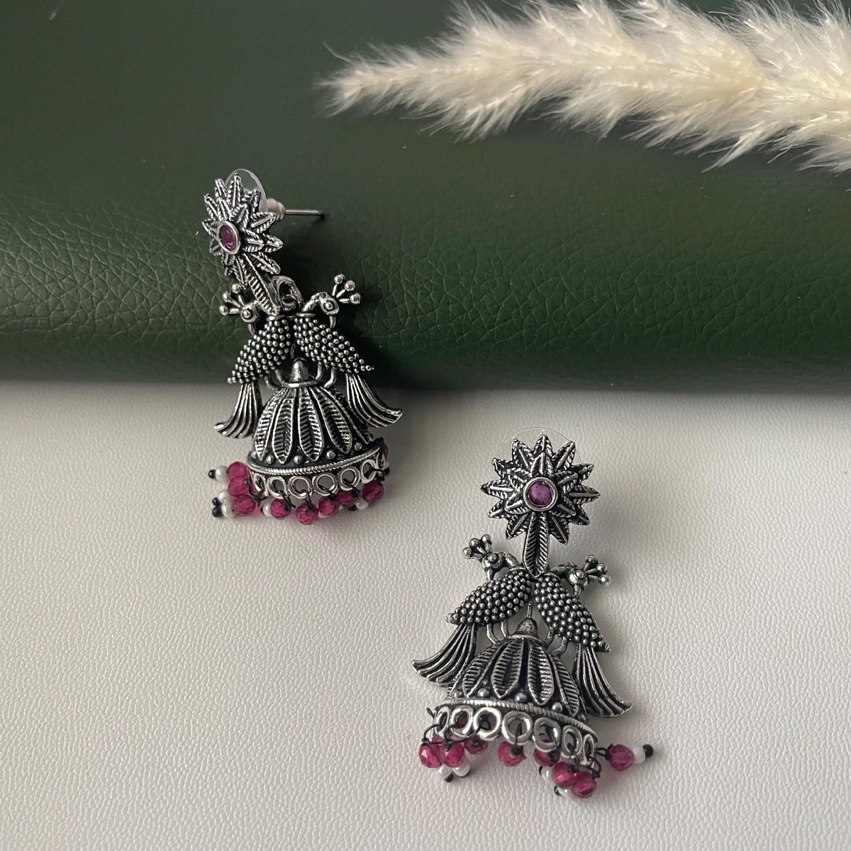 Oxidised green or ruby beads peacock half jhumkis