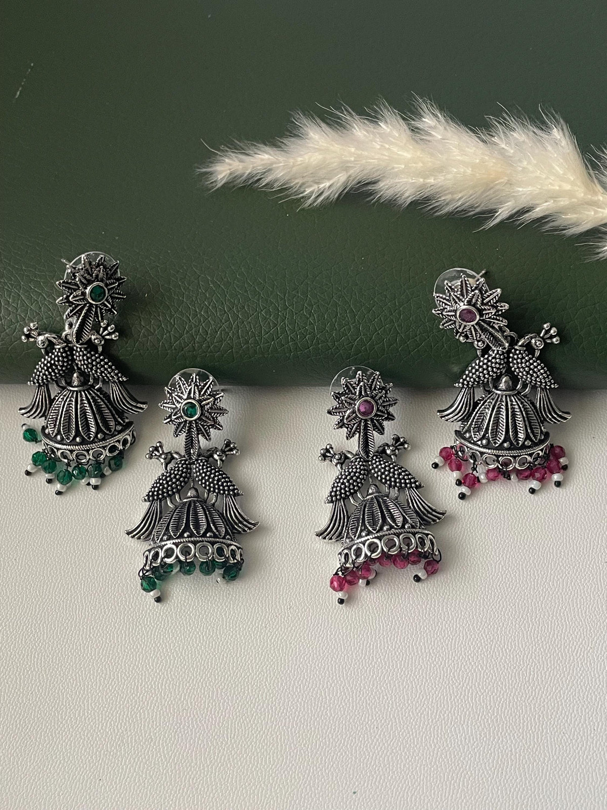 Oxidised green or ruby beads peacock half jhumkis