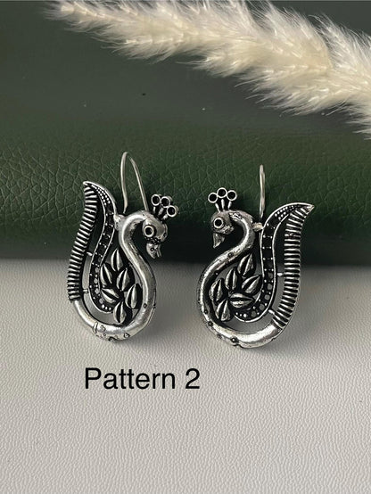 Oxidized peacock dangling earrings