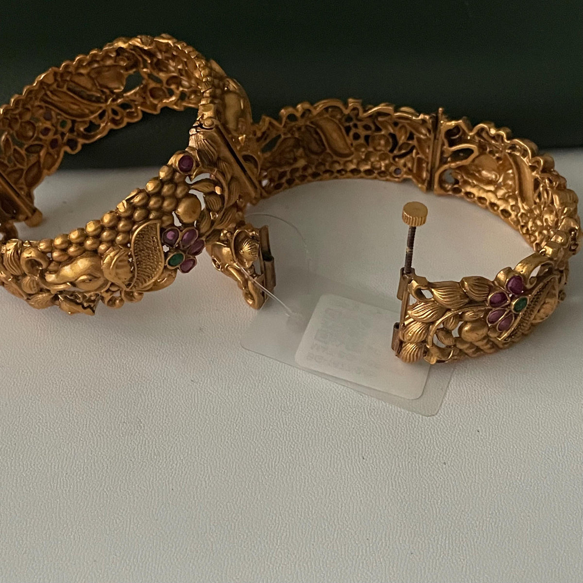 Gold plated kemp stone openable bangles with elephant flower carvings