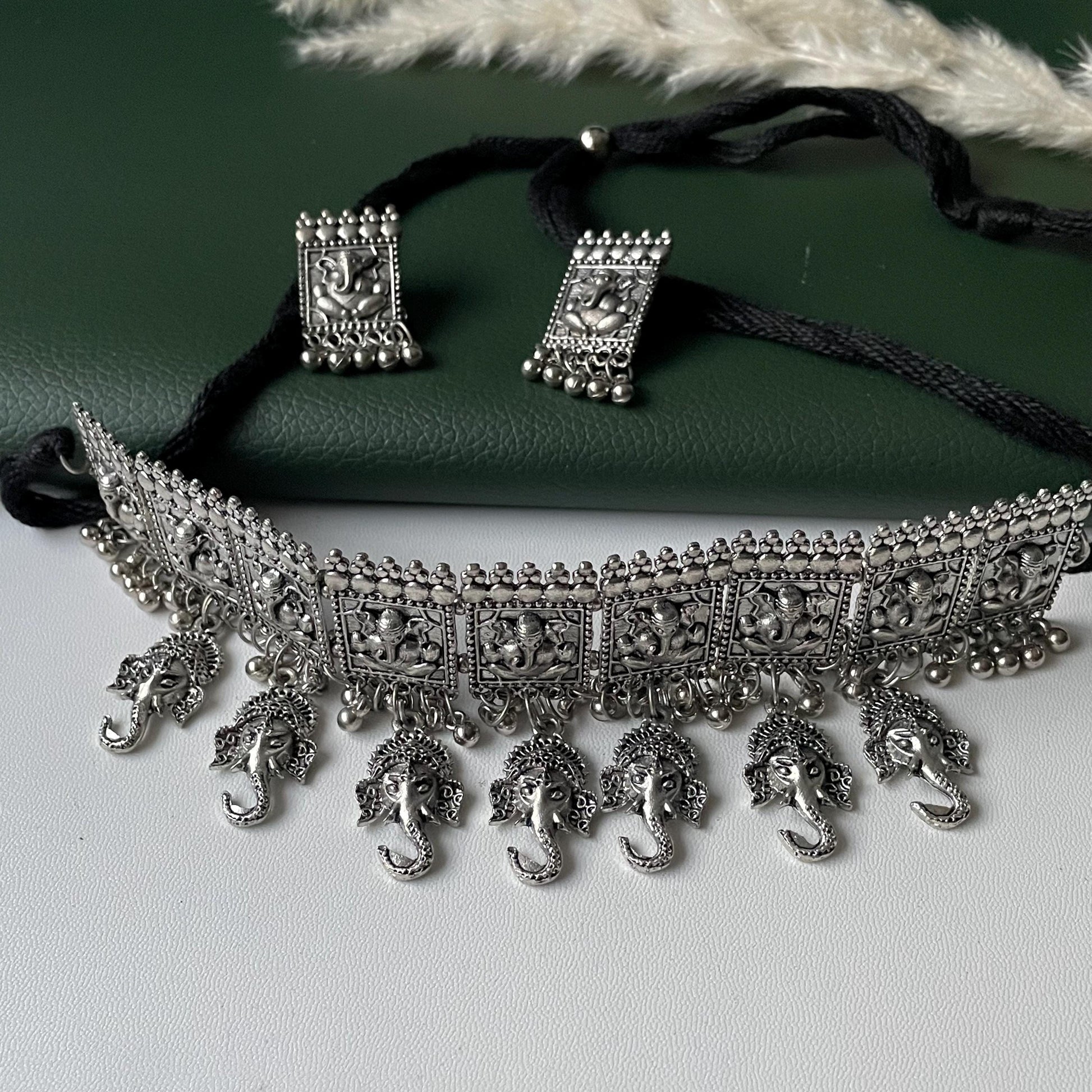 Oxidized Krishna Choker Necklace with Earrings: Red Beads