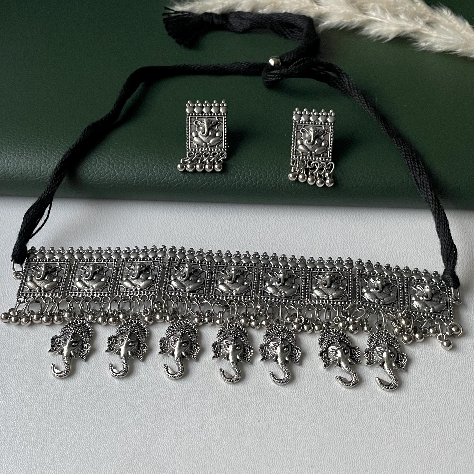 Oxidized Krishna Choker Necklace with Earrings: Red Beads