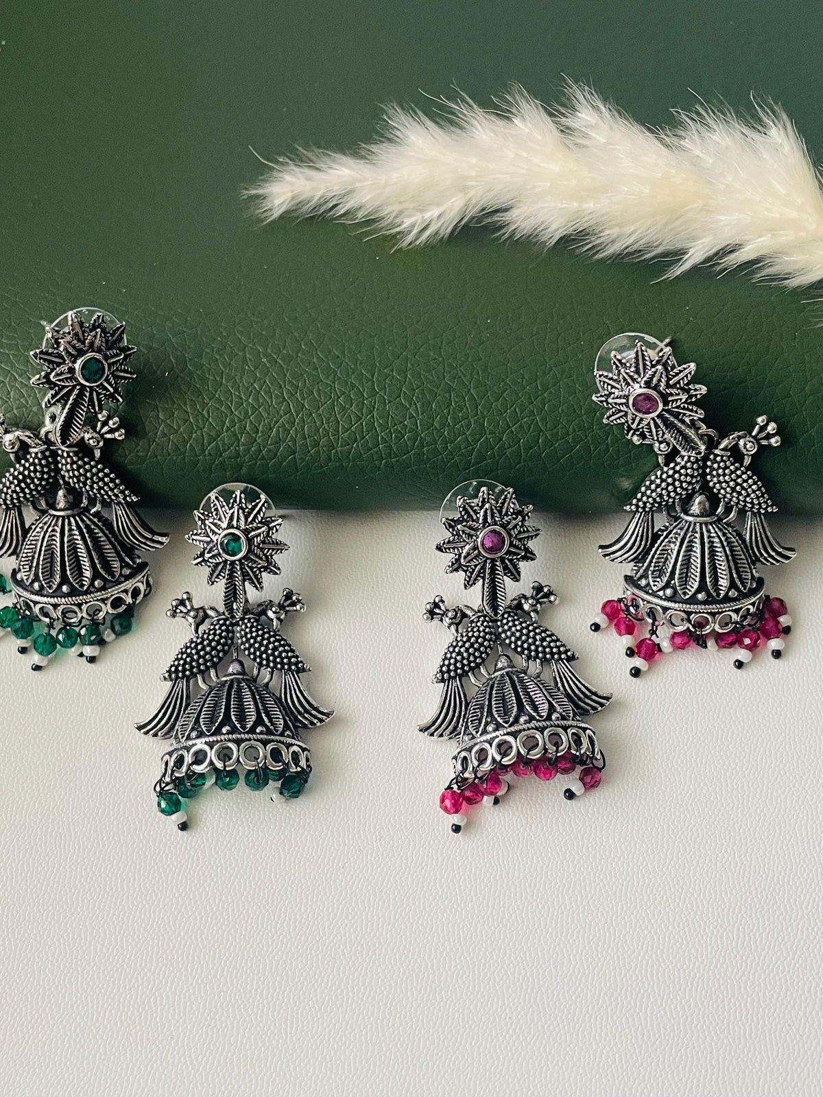Oxidised green or ruby beads peacock half jhumkis