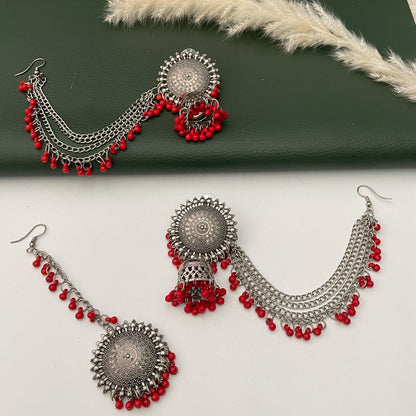 Oxidised jhumkis with ear-chains and Maang tikka
