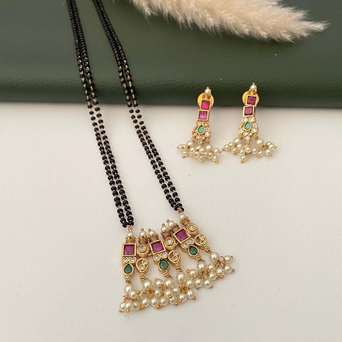 Gold Plated Tanmani Mangalsutra Set: Black Beads, Ruby green Pendant