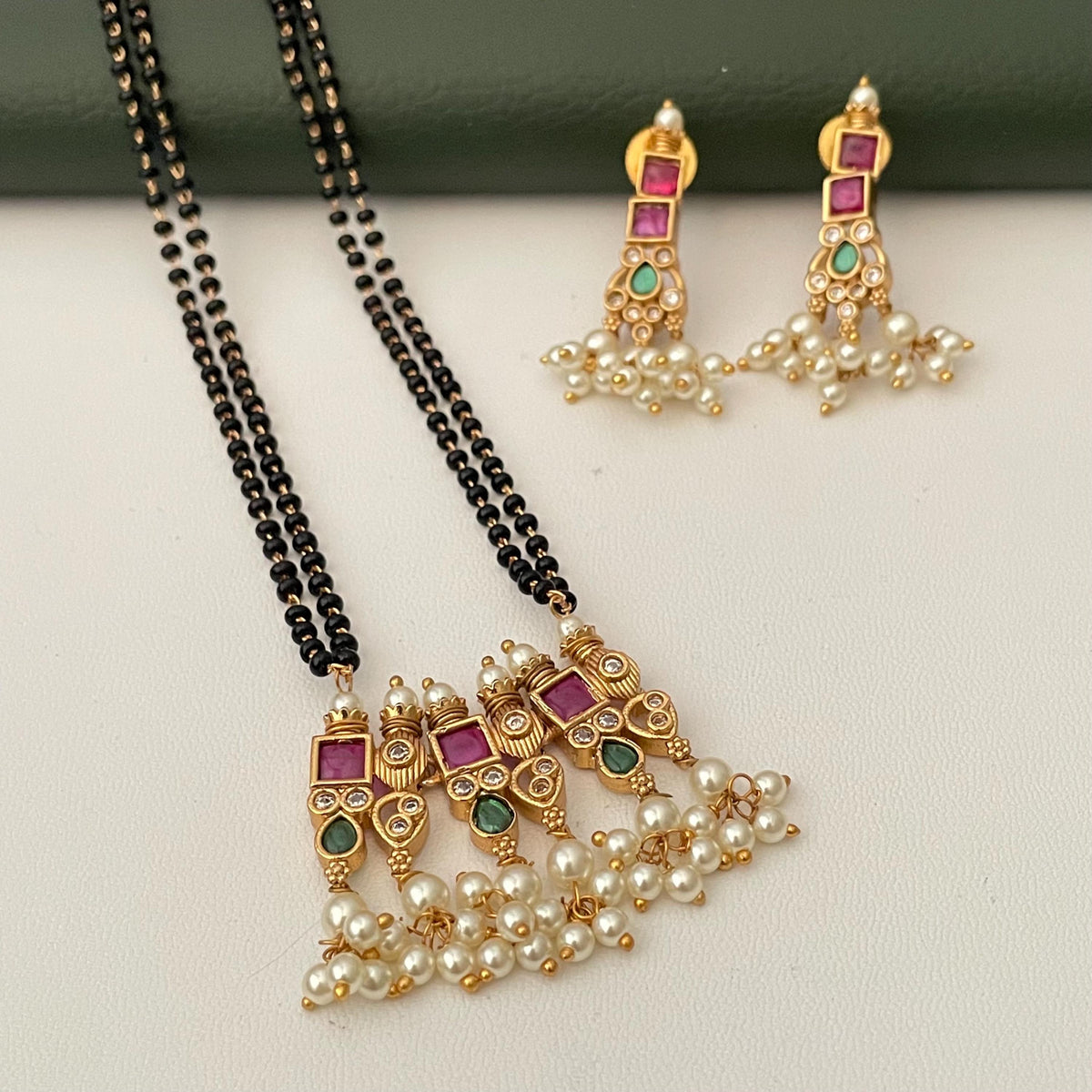 Gold Plated Tanmani Mangalsutra Set: Black Beads, Ruby green Pendant